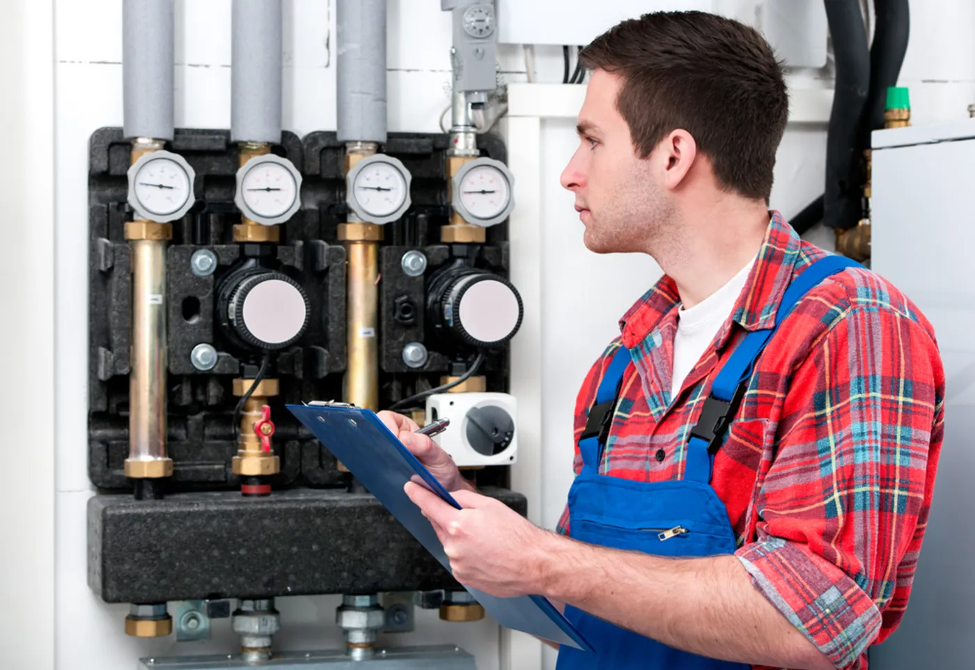 Gas Safe registered engineer servicing a Ideal boiler in London